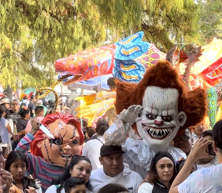 Hollywood horror movie images at Day of the Dead festivity in Mexico City.