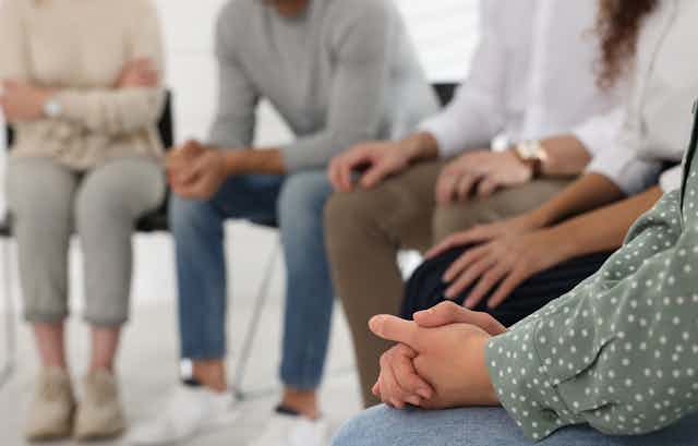 People attending group therapy