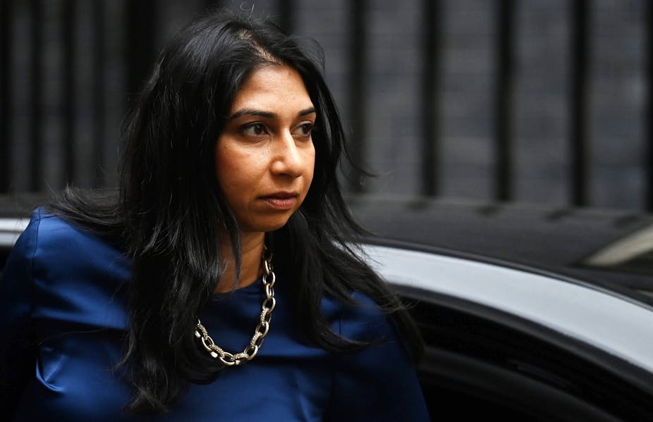Home secretary Suella Braverman stepping out of a car with a serious expression on her face