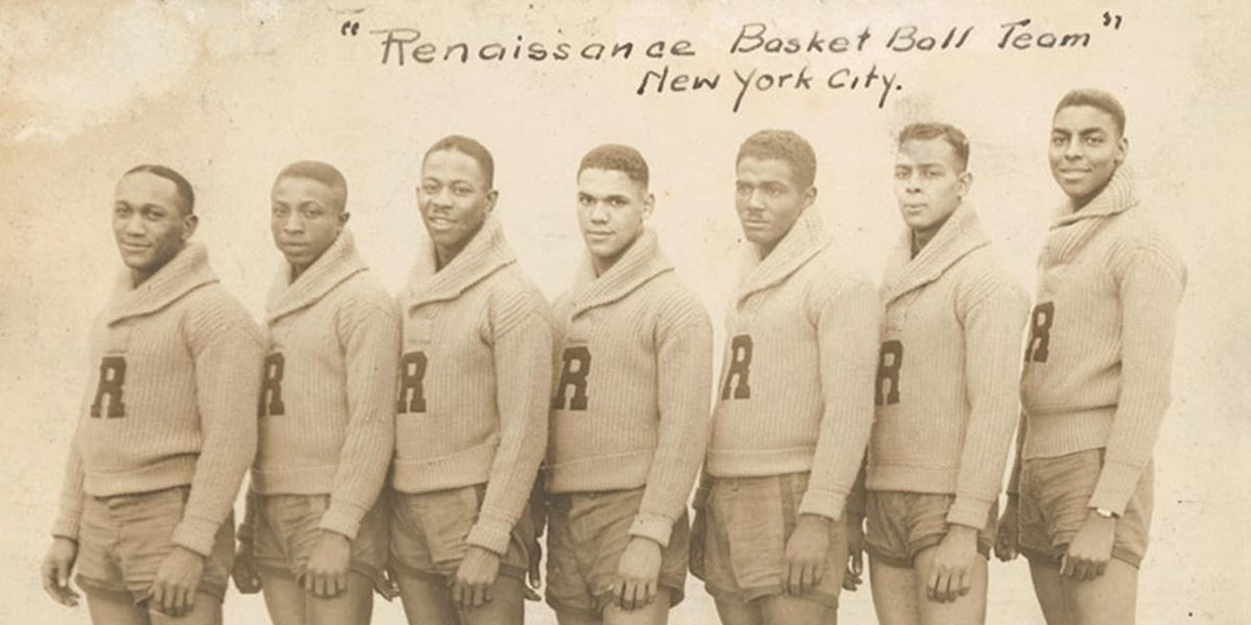 Faded sepia photograph of seven young Black men wearing sweaters with the letter 'R' stitched to the front.