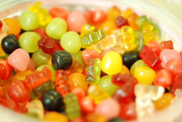 A full bowl of lollies, including gummy bears