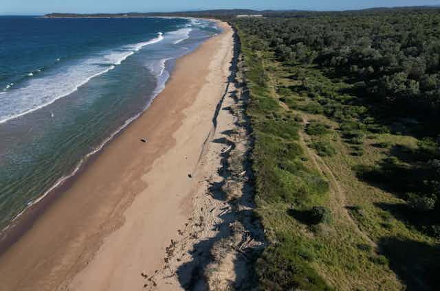 Aerial image of Bengello Beach in New South Wales after a storm in May 2022, showing coastal erosion