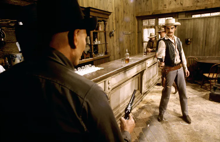 Yul Brynner as The Gunslinger, and Richard Benjamin as Peter Martin.