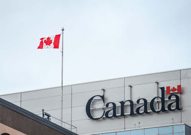 A building with a Canadian flag and Canada written on the side.