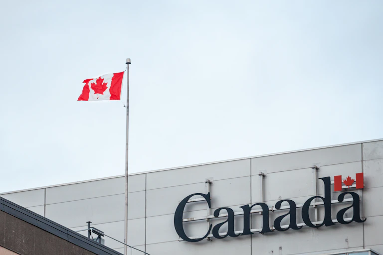 A building with a Canadian flag and Canada written on the side.