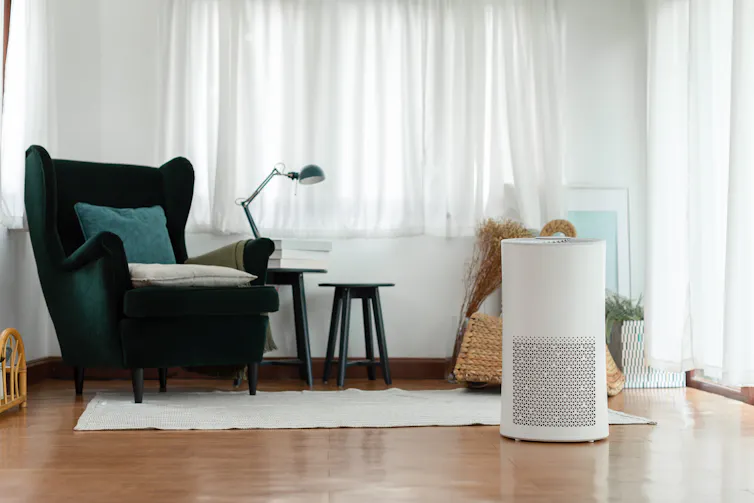 A HEPA air purifier in a living room.