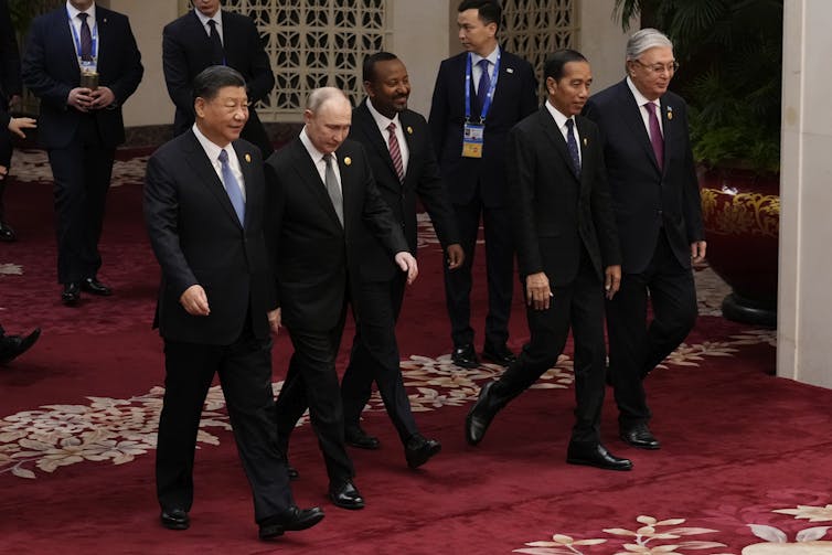 Leaders of China, Russia, Ethiopia, Indonesia and Kazakhstan walking.