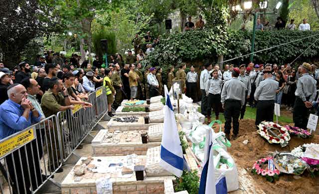 A funeral service at Mt. Herzl Military Cemetery in Jerusalem,