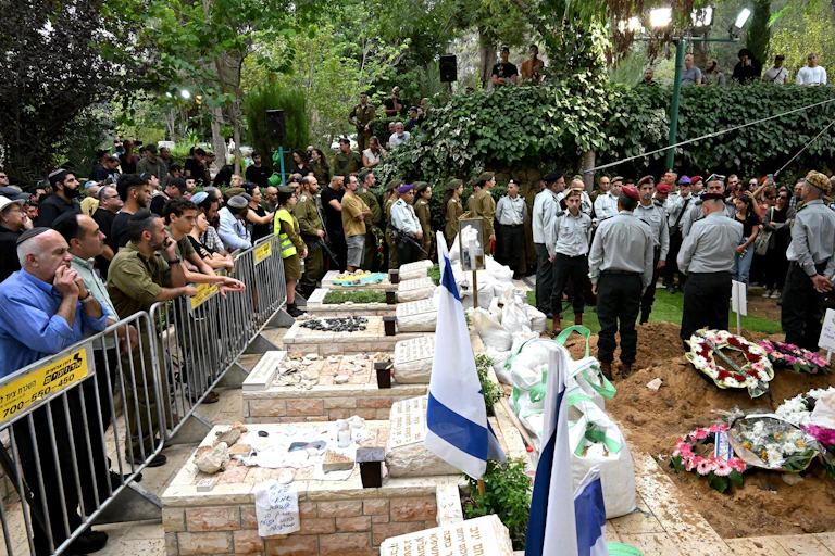 A funeral service at Mt. Herzl Military Cemetery in Jerusalem,