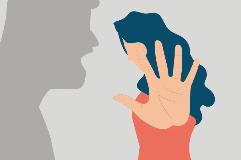 L'ombre de l'homme menace et accuse une femme maltraitée. Une femme dit NON.