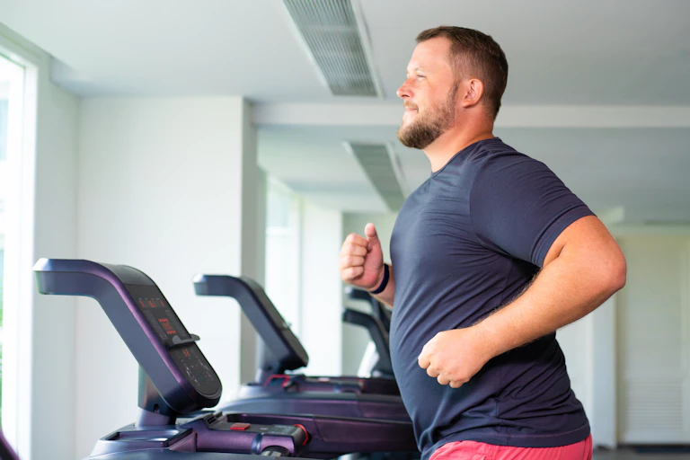 Man runs on treadmill