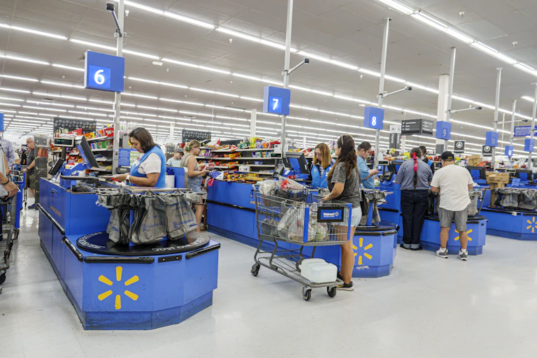 People buy stuff at a Walmart.