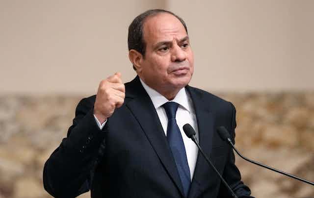 Egyptian president Abdel Fattah al-Sisi gestures during a speech.