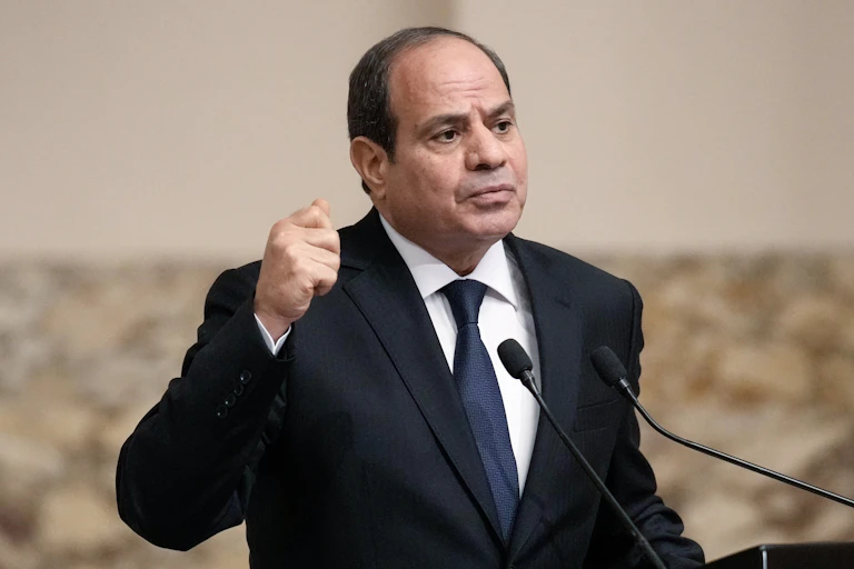 Egyptian president Abdel Fattah al-Sisi gestures during a speech.