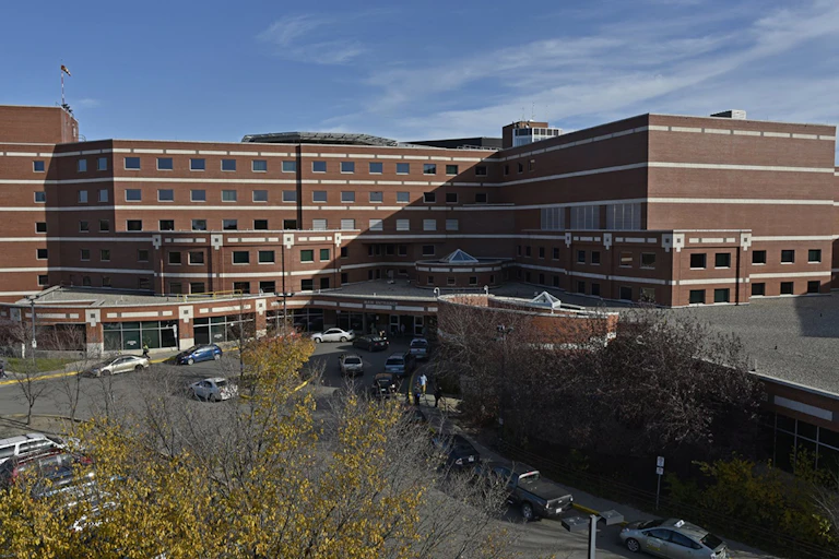 A large brown hospital building.