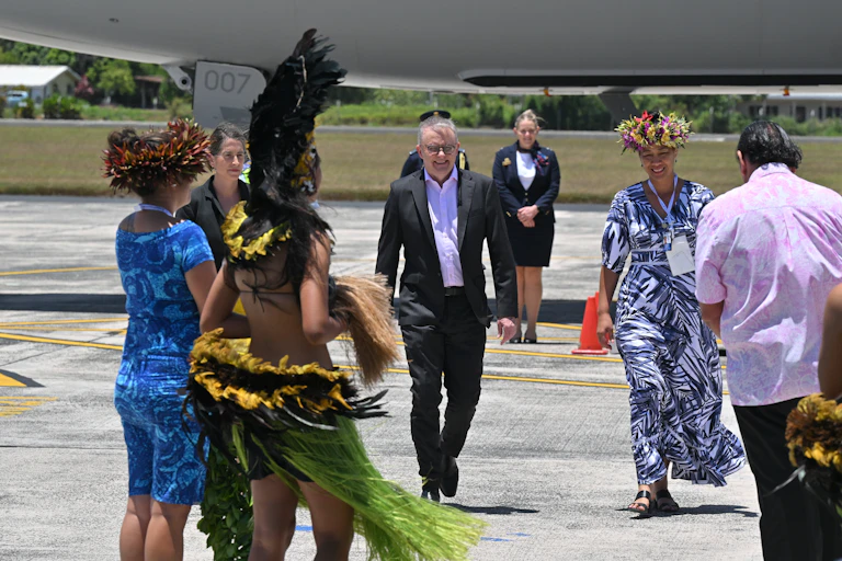 Man coming off plane