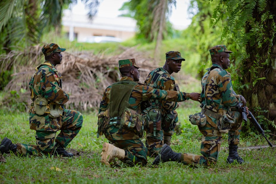 A group of soldiers kneeling