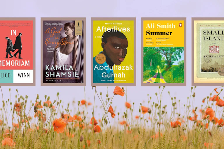book jackets placed on top of a field of poppies.