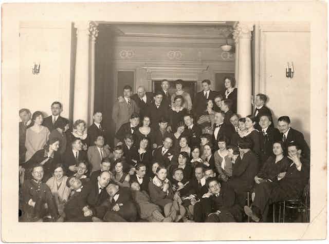 A black and white archival photograph of a group of students.