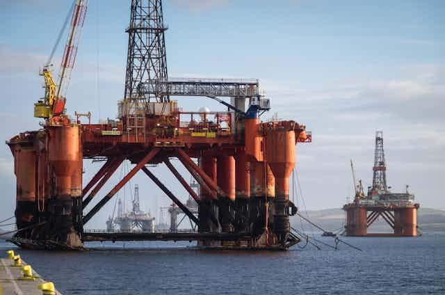 A drilling platform moored in a bay.