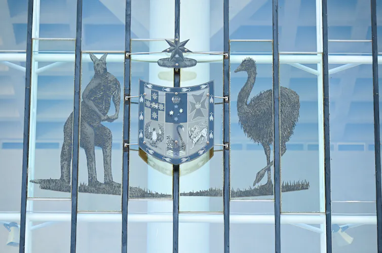 A close-up of the Australian coat of arms on the High Court building.