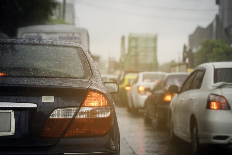 Cars in traffic jam on wet day