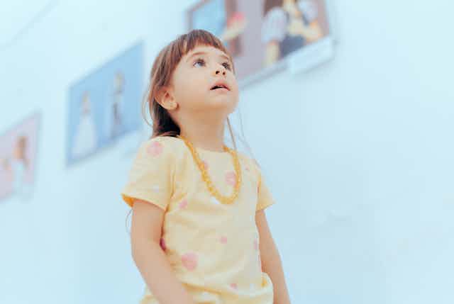 Young girl in a gallery