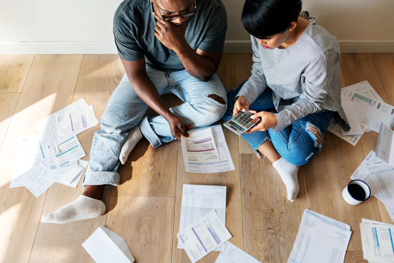 A couple working on their finances together.