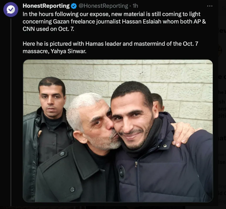 Screenshot fron X showing Palestinian photojournalist Hassan Eslayeh being embraced by Hamas leader Yahya SInwar.