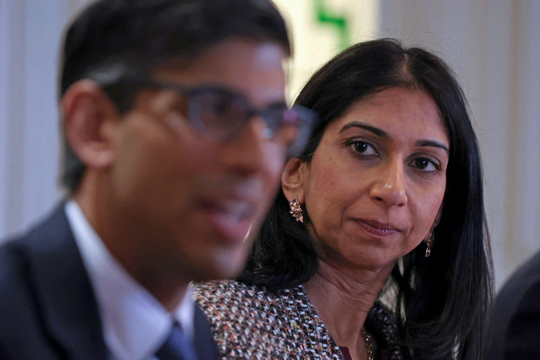 A close-up shot of Suella Braverman and Rishi Sunak.