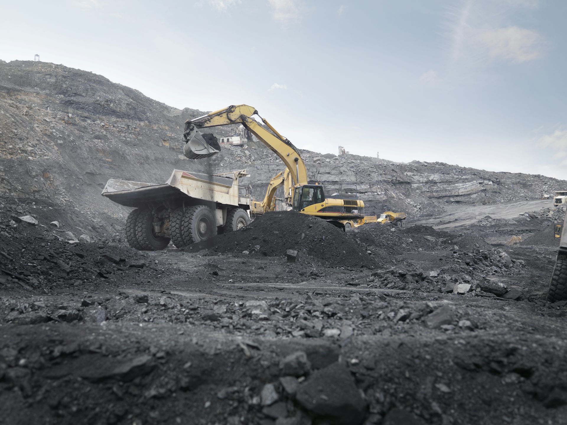 truck and digger coal mining