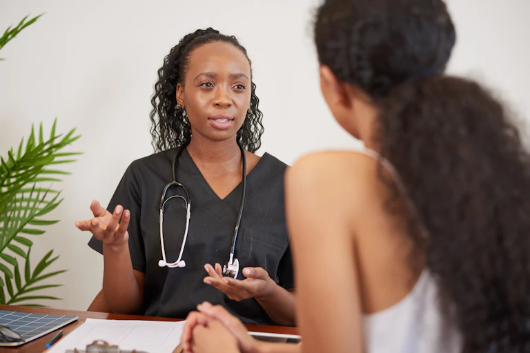 Doctor talks to patient