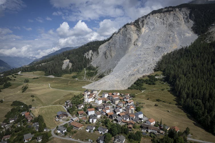 Aerial view of village with landslide.