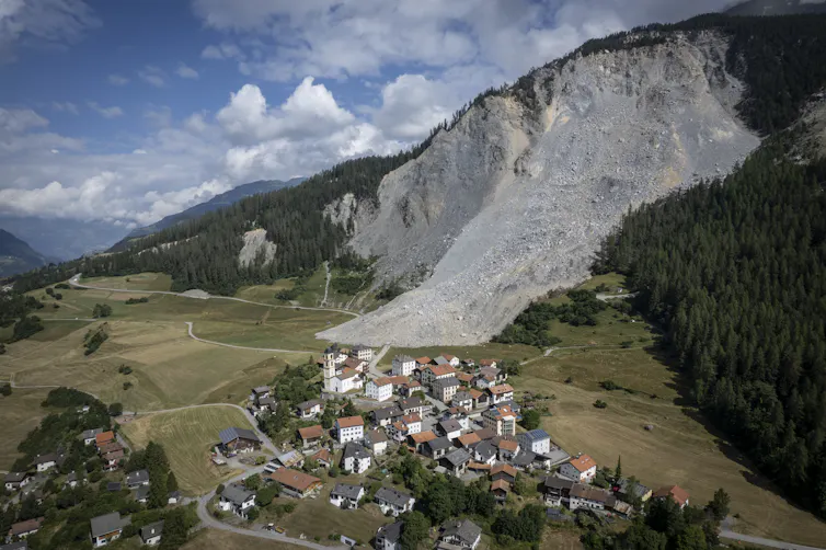 Aerial view of village with landslide.