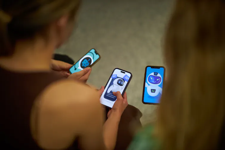 Young people look at chatbots on their phones.