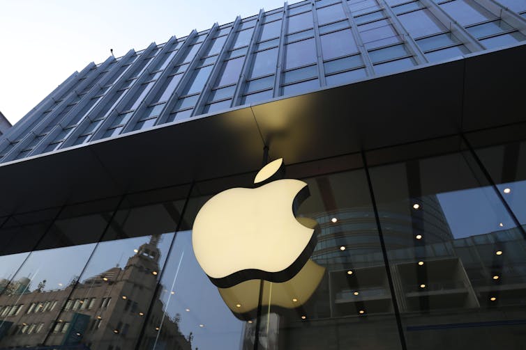 A giant apple symbol on the front of the Apple store in Shanghai, China.
