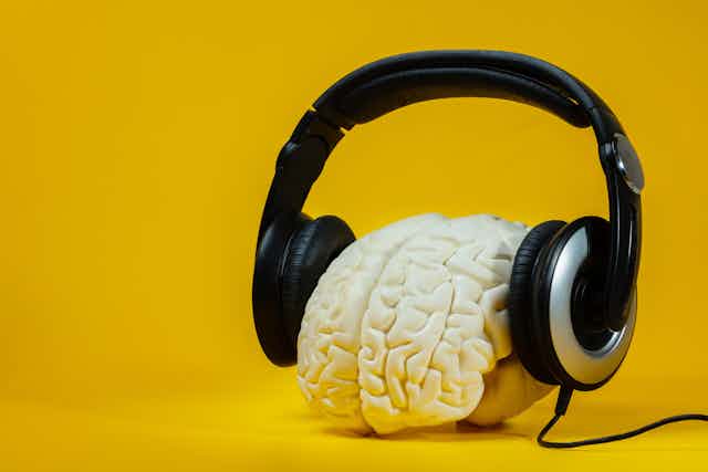 Headphones on brain