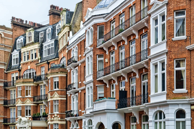 The façades of several mansion blocks.