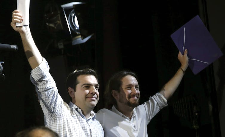 Alexis Tsipras and Pablo Iglesias greeting crowds with arms raised triumphantly.