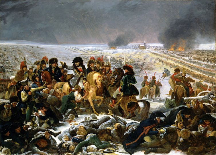 Pintura de un hombre en primer término dirigiendo la batalla de un inmenso ejército que se ve al fondo.