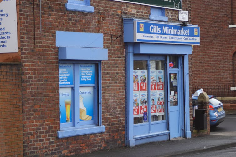A blue-fronted corner shop.