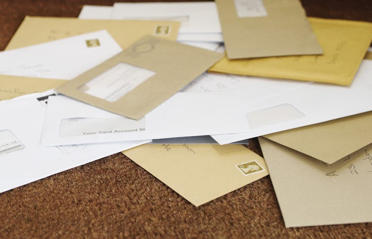 Envelopes on a mat.