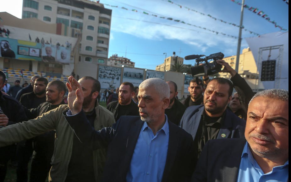 Hamas leader Yahya SInwar with e agroup of his aides in Gaza City