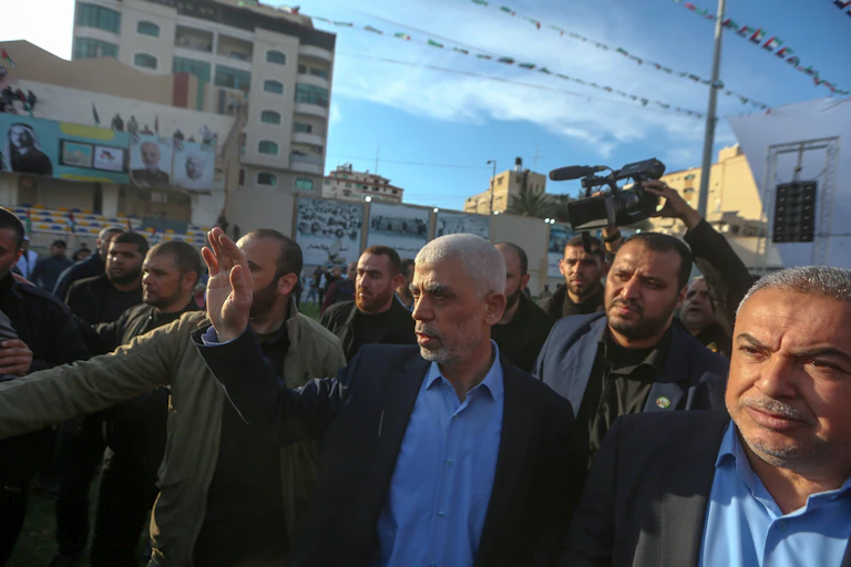 Hamas leader Yahya SInwar with e agroup of his aides in Gaza City