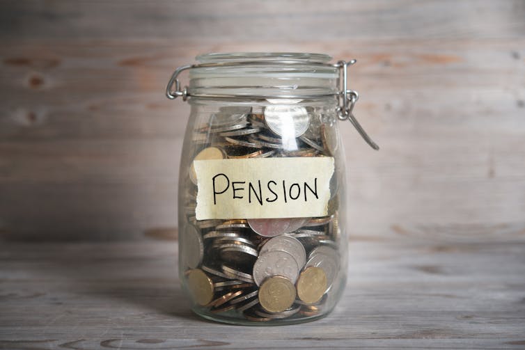 Jar filled with coins, labelled pension.
