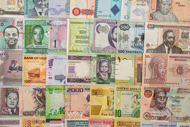 A collage of banknotes from various African countries.