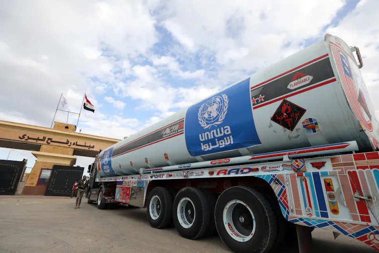An Egyptian truck waits at the Rafah crossing to deliver fuel to the Gaza Strip