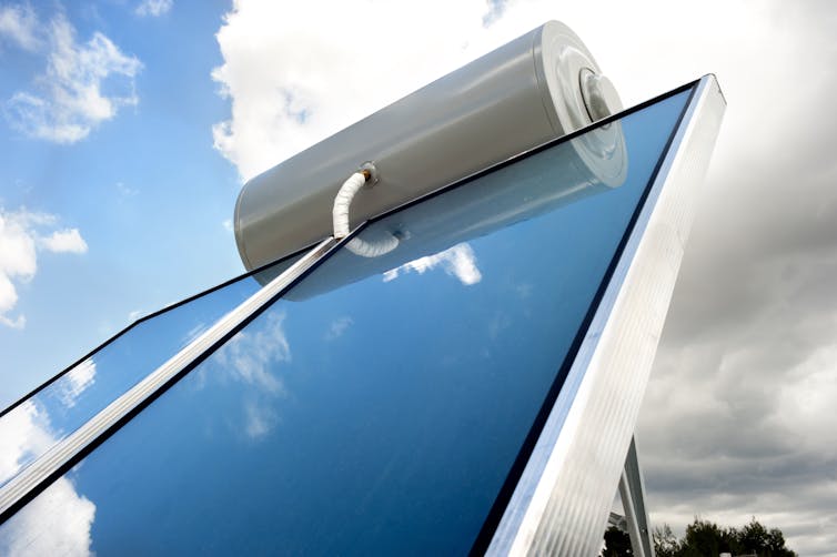 A diagonally mounted solar panel with a white cable.