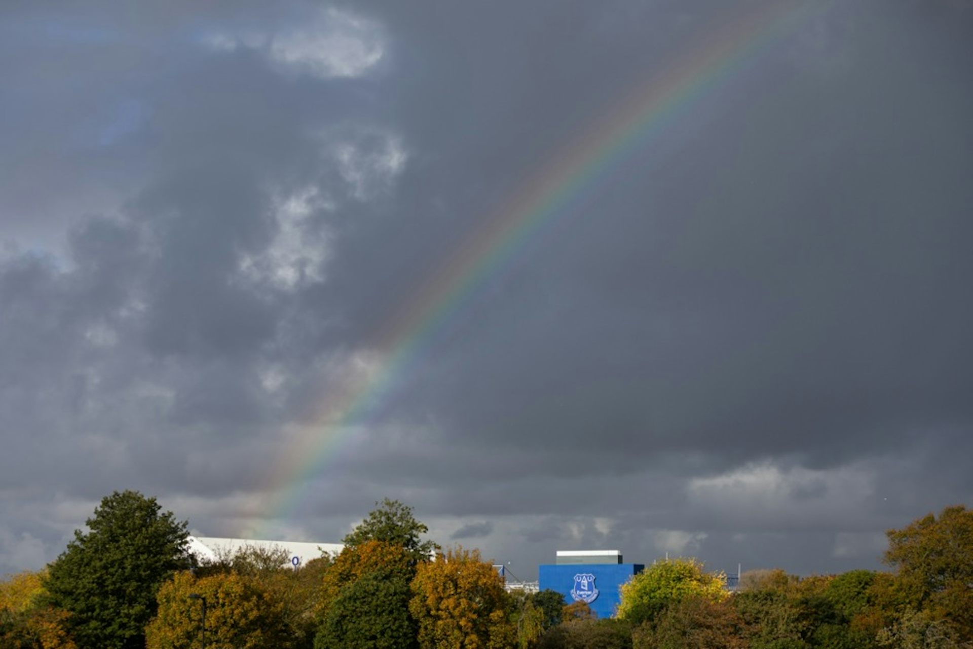 Rainbow in sky of Everton's stadium.