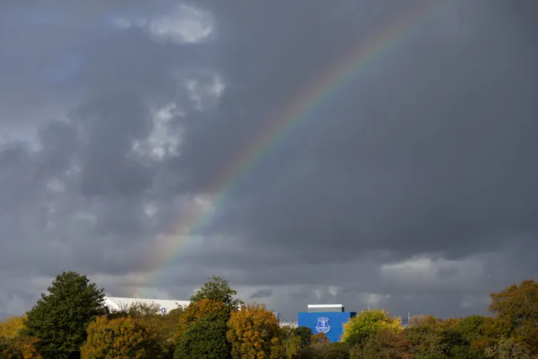 Rainbow in sky of Everton's stadium.